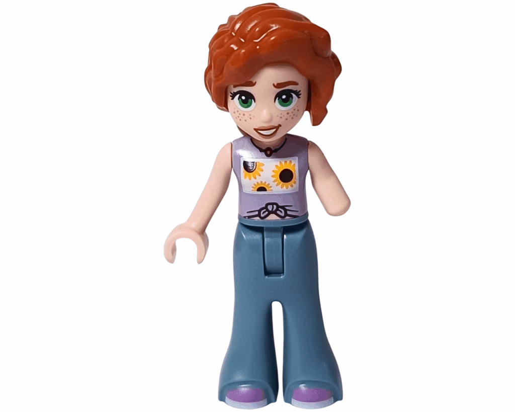 LEGO Friends 30696 オータムのワッフル屋さん ミニドールのオータム。ラベンダーのひまわり柄トップスにブルーのパンツ、足もとはパープルの靴を履いている