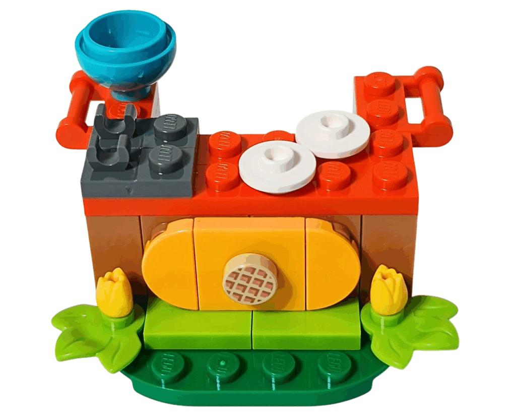 EGO Friends 30696 オータムのワッフル屋さん ワッフルメーカーの組立途中。グレーの焼き台と青いボウルを屋台の上に配置している