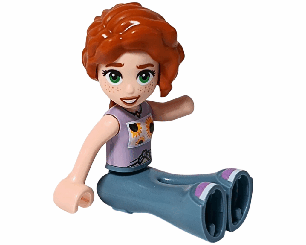 レゴ フレンズ 30696 オータムのミニドール座りポーズ。ラベンダーのトップスとブルーのパンツ姿で座っている
