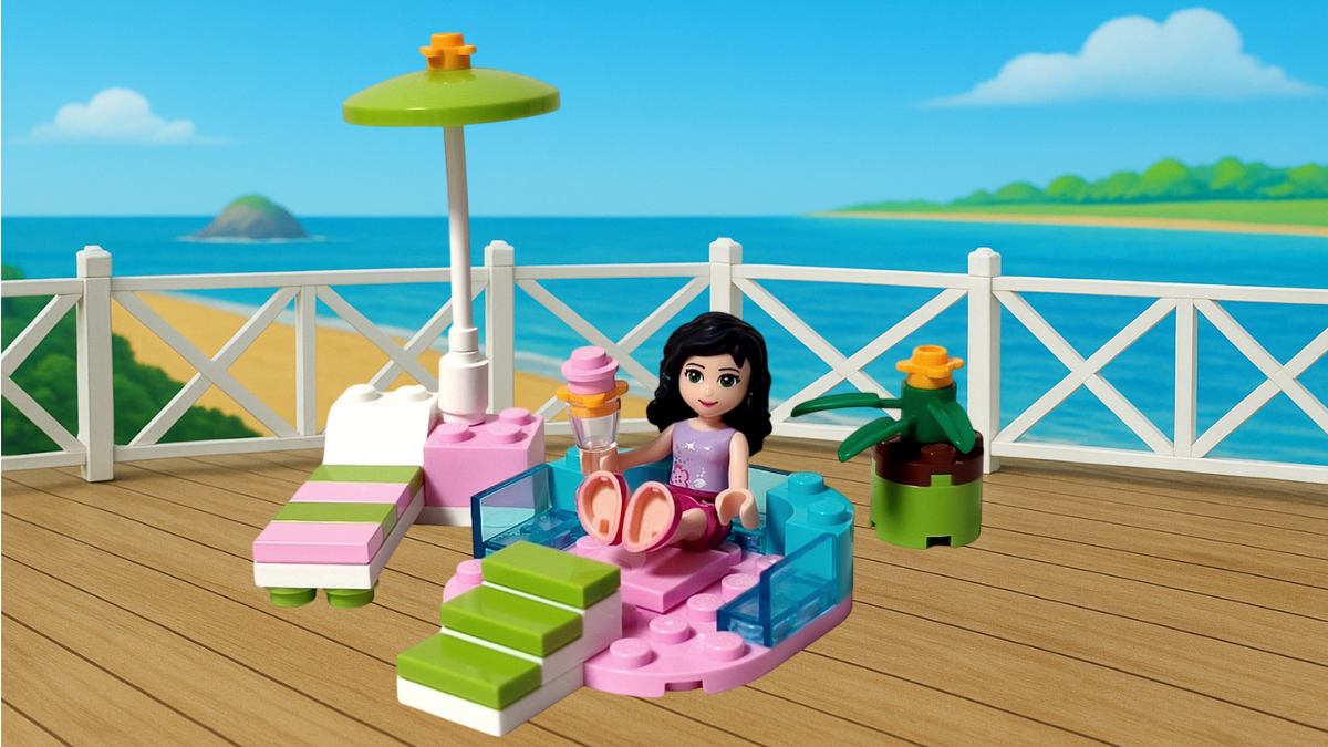 レゴ フレンズ 3931 ハッピープールサイド 完成シーン。海辺のデッキでエマがプールに入り、パラソルとデッキチェア、植木鉢が並ぶ夏の風景