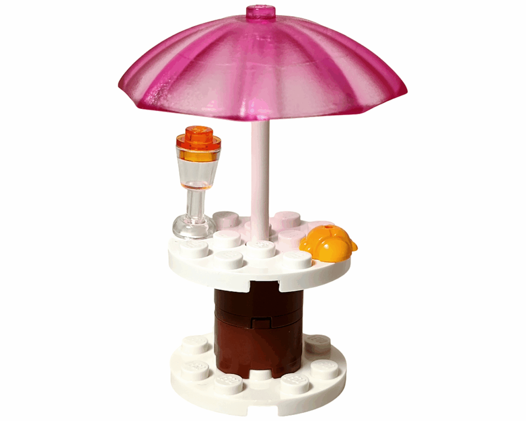 LEGO Friends 41008 スプラッシュプール パラソル付きのテーブル。オレンジのドリンクと黄色のてんとう虫パーツが置かれている