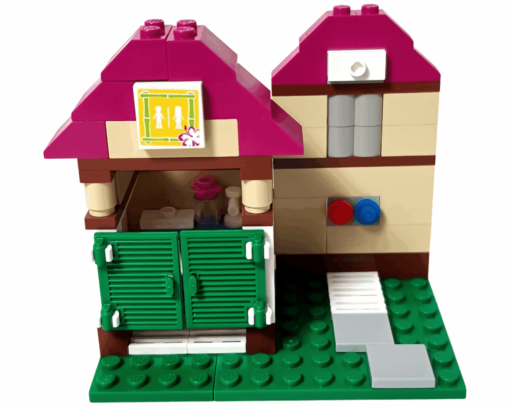 LEGO Friends 41008 スプラッシュプール 更衣室の屋根を取りつける。ピンクの屋根と黄色い蝶の飾りがついている