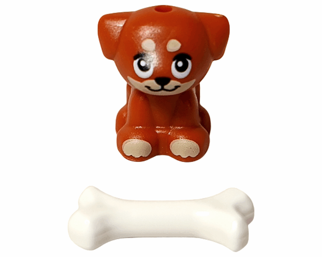 LEGO Friends 42668 子犬アイラとホネのセット。正面を向く子犬の前に白いホネが置かれている。