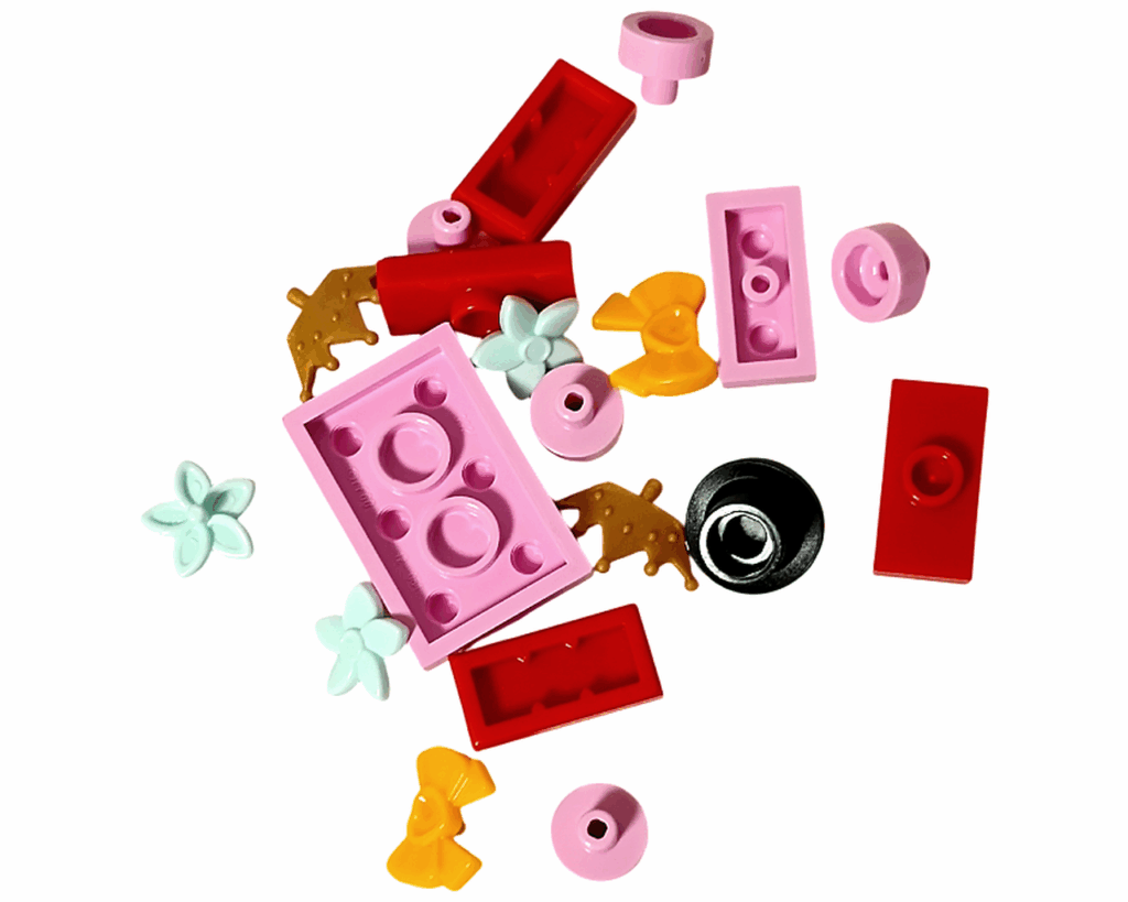 LEGO Friends 42668 22日目のパーツ一覧。ピンク・赤・金のブロックとリボンや花のパーツなど。