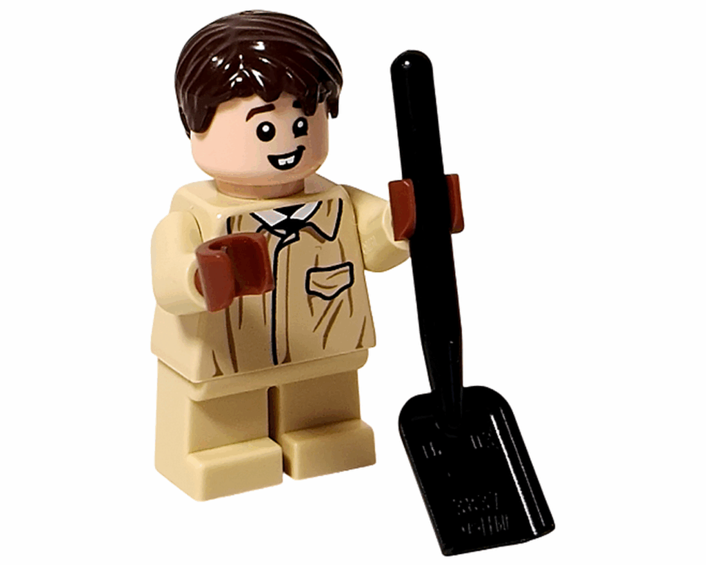 LEGO Harry Potter 76445 ネビル・ロングボトム ミニフィグが黒いスコップを持っている。