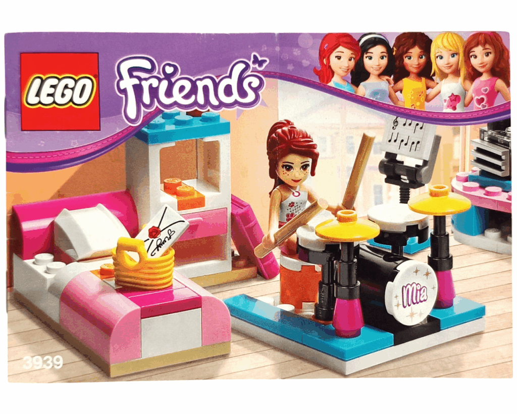 LEGO Friends 3939 ルームデコセット 組立説明書表紙。ミアがドラムを叩き、ベッドとシェルフが背景に描かれている