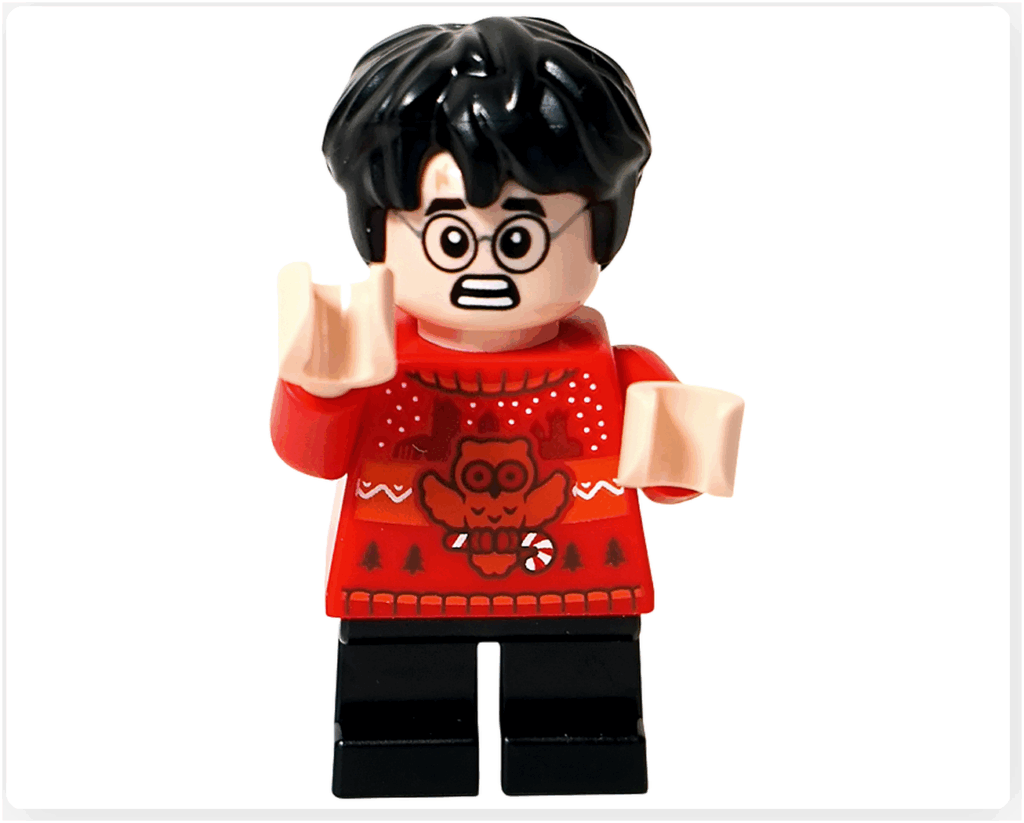 LEGO Harry Potter 76456「ハリー・ポッター アドベントカレンダー2025」ハリー・ポッターのミニフィギュア（驚きの表情）。 口を開けた表情で前を見つめる姿。赤いセーターにフクロウ柄のプリント、黒いパンツを着用している。