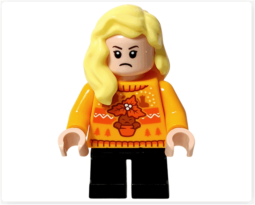 LEGO Harry Potter 76456「ハリー・ポッター アドベントカレンダー2025」 ハンナ・アボットのミニフィギュア（真剣な表情）。 オレンジイエローのセーターを着て、口を結び眉を寄せた集中した顔で前を見つめている。