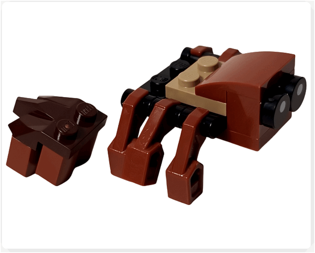 LEGO Harry Potter 76456「ハリー・ポッター アドベントカレンダー2025」アラゴグ組立途中。 胴体部分と脚の一部が完成しており、茶色と黒のパーツが組み合わさっている。