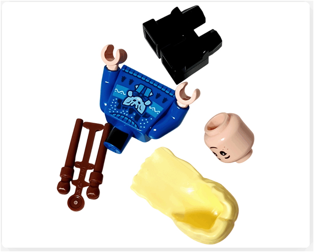 LEGO Harry Potter 76456「ハリー・ポッター アドベントカレンダー2025」16日目のルーナ・ラブグッドのパーツ。 青いセーターに不思議な生き物モチーフ、黒い脚部、金髪ロングヘア、杖、笑顔の表情パーツが並ぶ。