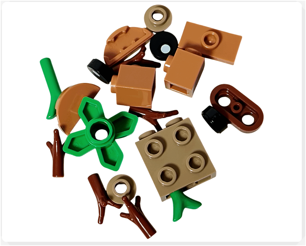 LEGO Harry Potter 76456 アドベントカレンダー2025の23日目パーツ。 茶色とベージュのブロック、枝や葉のパーツ、黒い丸型パーツなどを含む構成。 マンドレイクを組み立てるためのブロック一式。