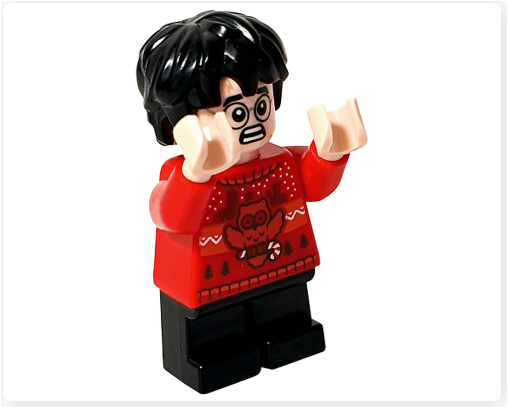 LEGO Harry Potter 76456「アドベントカレンダー2025（Harry Potter Advent Calendar 2025）」登場キャラクター、ハリー・ポッターのミニフィギュア。 驚いた表情で両手を上げたポーズ。赤いセーター姿の冬コーデ。