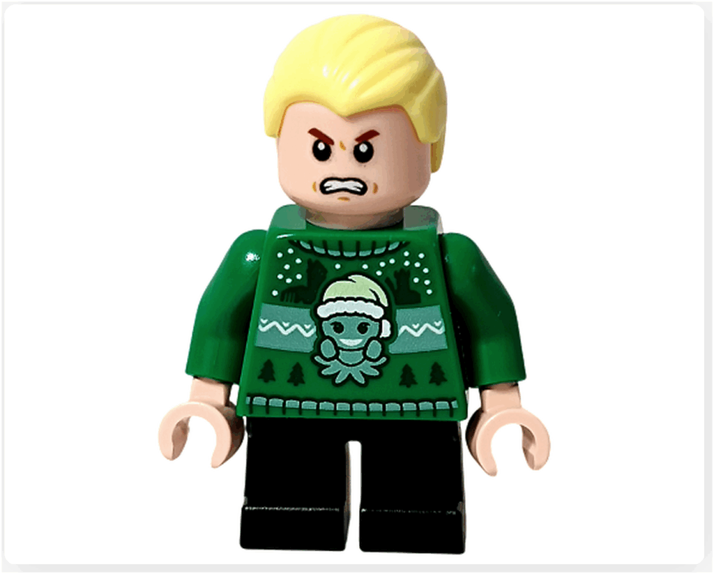 LEGO Harry Potter 76456「アドベントカレンダー2025」登場キャラクター、ドラコ・マルフォイのミニフィギュア。 怒った表情で緑のセーターを着た冬の衣装。