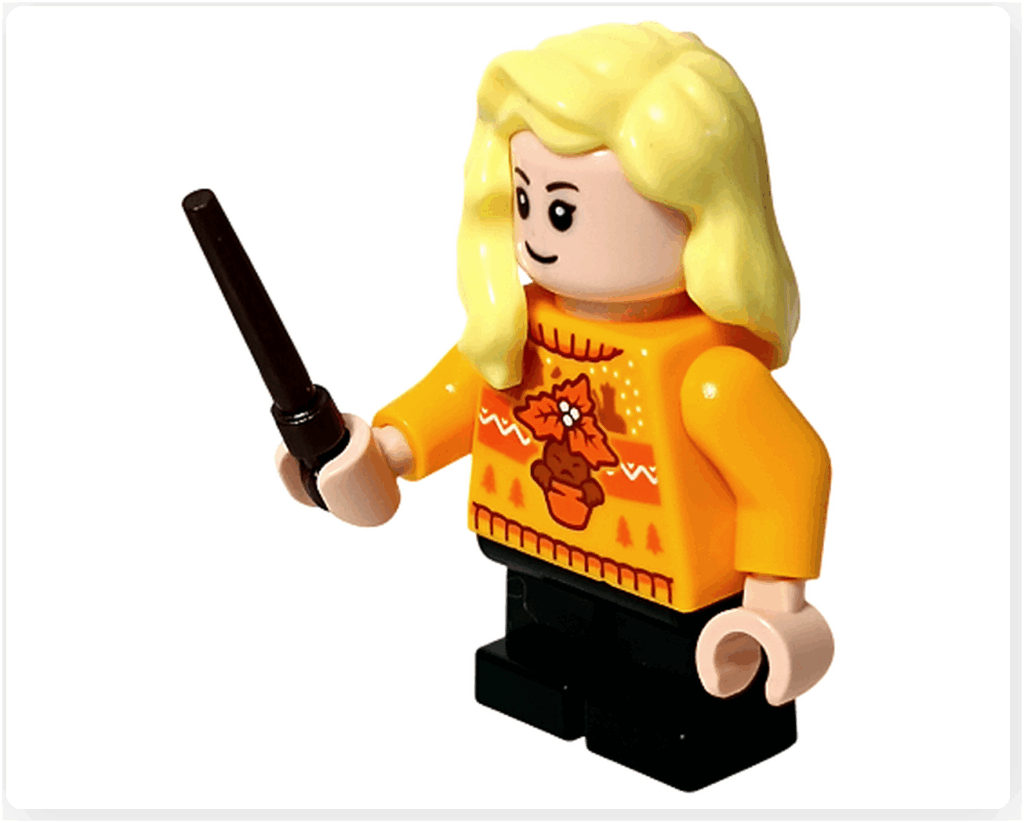 LEGO Harry Potter 76456「アドベントカレンダー2025」登場キャラクター、ハンナ・アボットのミニフィギュア。 オレンジのセーターを着て魔法の杖を持つ冬の装い。
