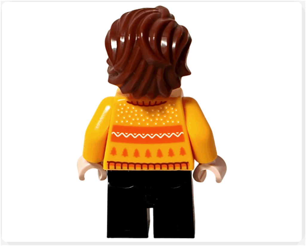 LEGO Harry Potter 76456「アドベントカレンダー2025」登場キャラクター、セドリック・ディゴリーのミニフィギュア背面。 黄色いセーターに冬の模様が描かれている。