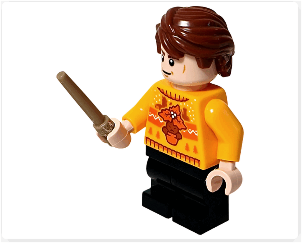 LEGO Harry Potter 76456「アドベントカレンダー2025」登場キャラクター、セドリック・ディゴリーのミニフィギュア。 黄色いセーター姿で杖を構えるポーズ。