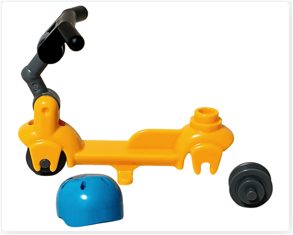 EGO CITY 60475 Advent Calendar 2025（4日目）キックスクーターの組立途中。黄色い車体にハンドルと前輪が取り付けられた段階。