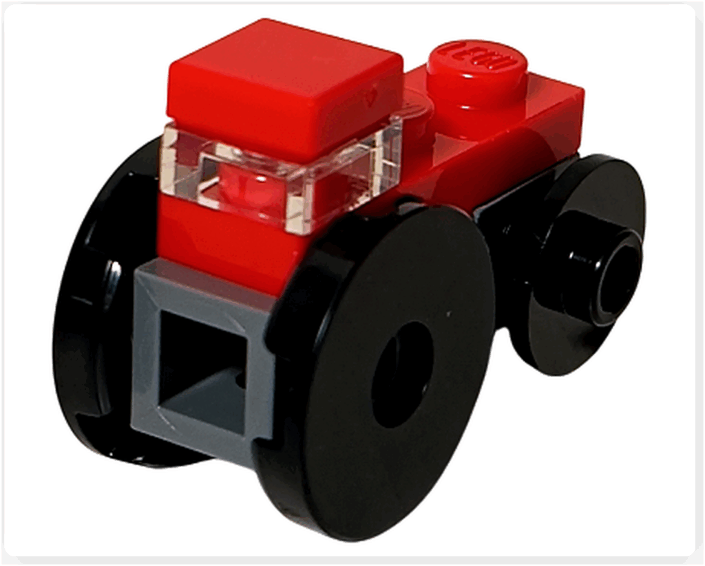 LEGO CITY 60475 Advent Calendar 2025（6日目）ミニ・トラクターの背面。大型後輪と赤い車体後方、クリアキャビンパーツが見える後方ビュー。