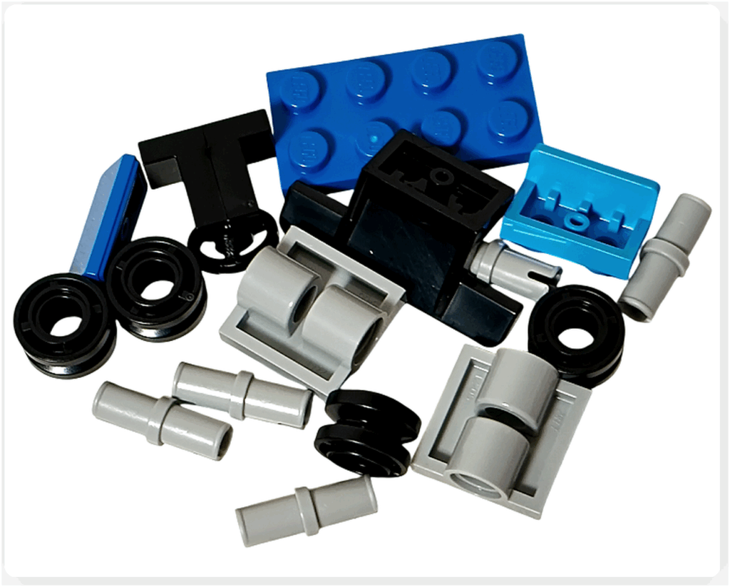 LEGO CITY 60475 Advent Calendar 2025（8日目）除雪車のパーツ構成。青い車体ブロック、黒い除雪ブレード、4輪ユニットが含まれる。