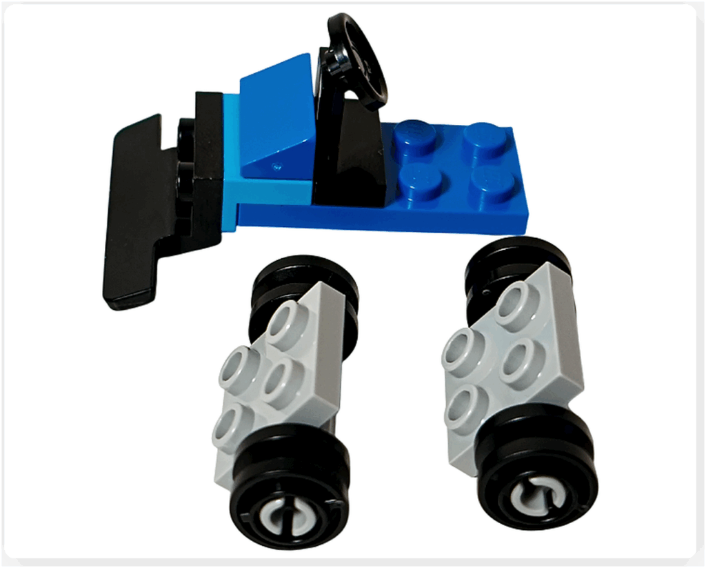 LEGO CITY 60475 Advent Calendar 2025（8日目）除雪車の組立途中。青い車体にハンドルと前方ブレード基部が取り付けられた状態。