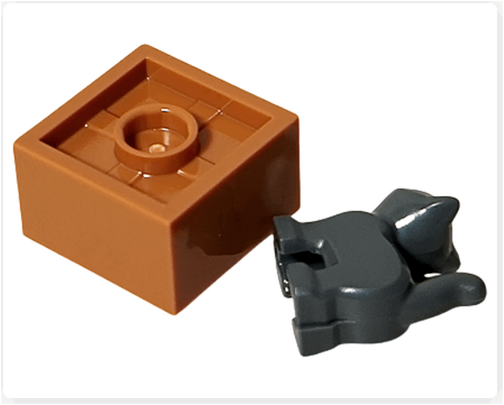 LEGO CITY 60475 Advent Calendar 2025（11日目）箱に入った子猫のパーツ一式。ブラウンの箱パーツとグレーの子猫フィギュアが並んでいる構成写真。