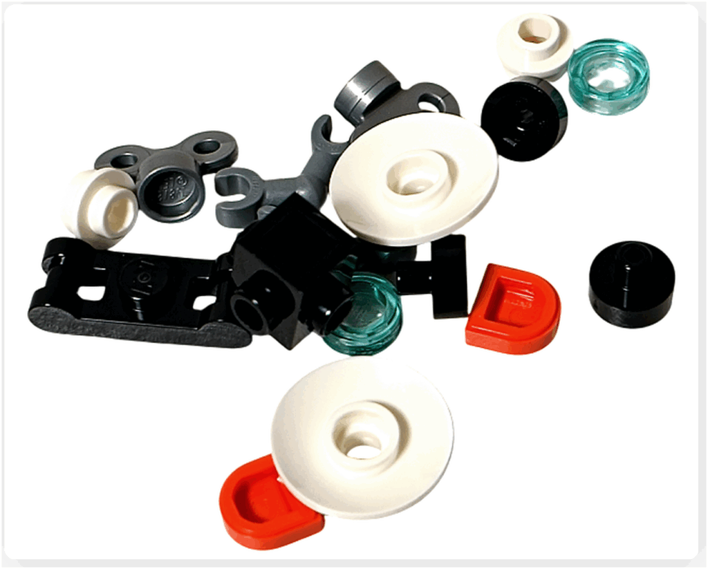 LEGO CITY 60475 Advent Calendar 2025（16日目）小型ロボットのパーツ一式。胴体・アーム・丸いヘッドライトパーツ・ゼンマイ部品を上から並べた構成写真。