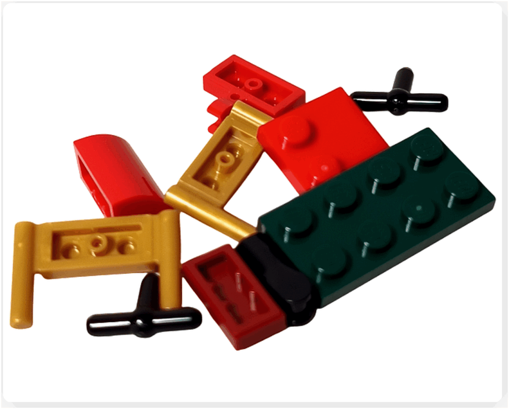 LEGO CITY 60475 Advent Calendar 2025(23日目)ソリのパーツ構成。赤いボディパーツ、ゴールドのランナー、黒いハンドルなどが含まれる。