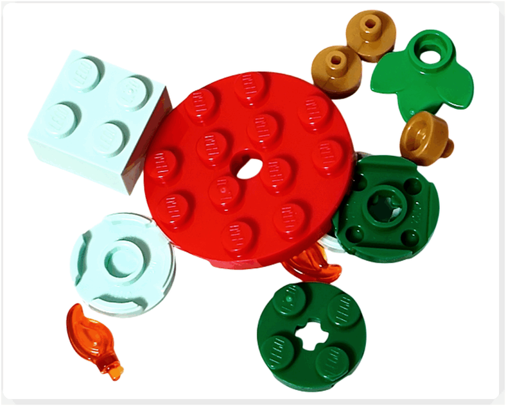 LEGO Friends 41758「アドベントカレンダー2023」16日目のパーツ。赤い丸プレート、ミントグリーンの台座、緑の飾りパーツ、ライトオレンジの小物などが含まれるデザートテーブル用セットです。