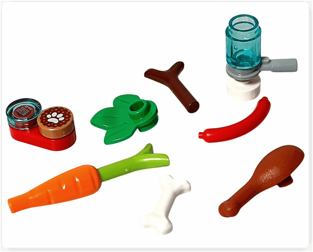 LEGO Friends アドベントカレンダー2023 17日目。にんじん、葉パーツ、骨、ソーセージ、ドラムスティック、ボトル、フード容器など食材と調理具の完成パーツ。