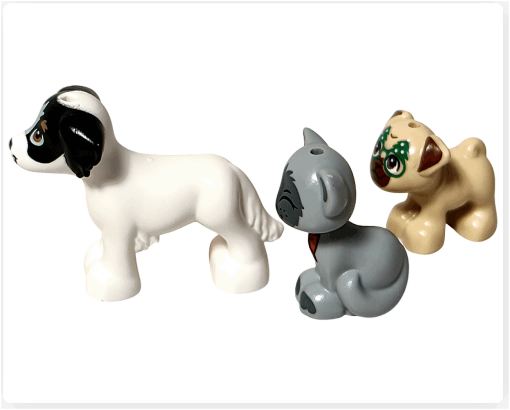 LEGO Friends アドベントカレンダー2023 18日目のシーン。白い犬デイジーと灰色のガートルードの後ろを、クリスマス柄のゴーグルをつけた犬のダンゴが歩いてついていく様子。