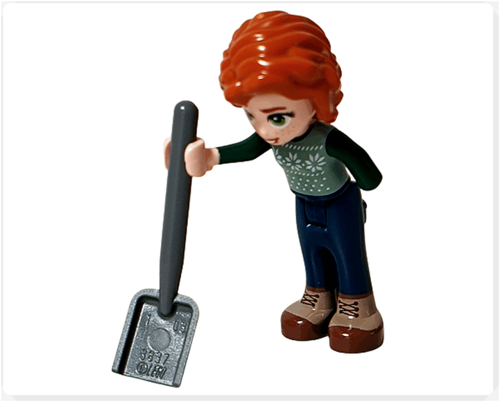 LEGO Friends 41758 オータムがグレーのスコップを両手で持つポーズ。