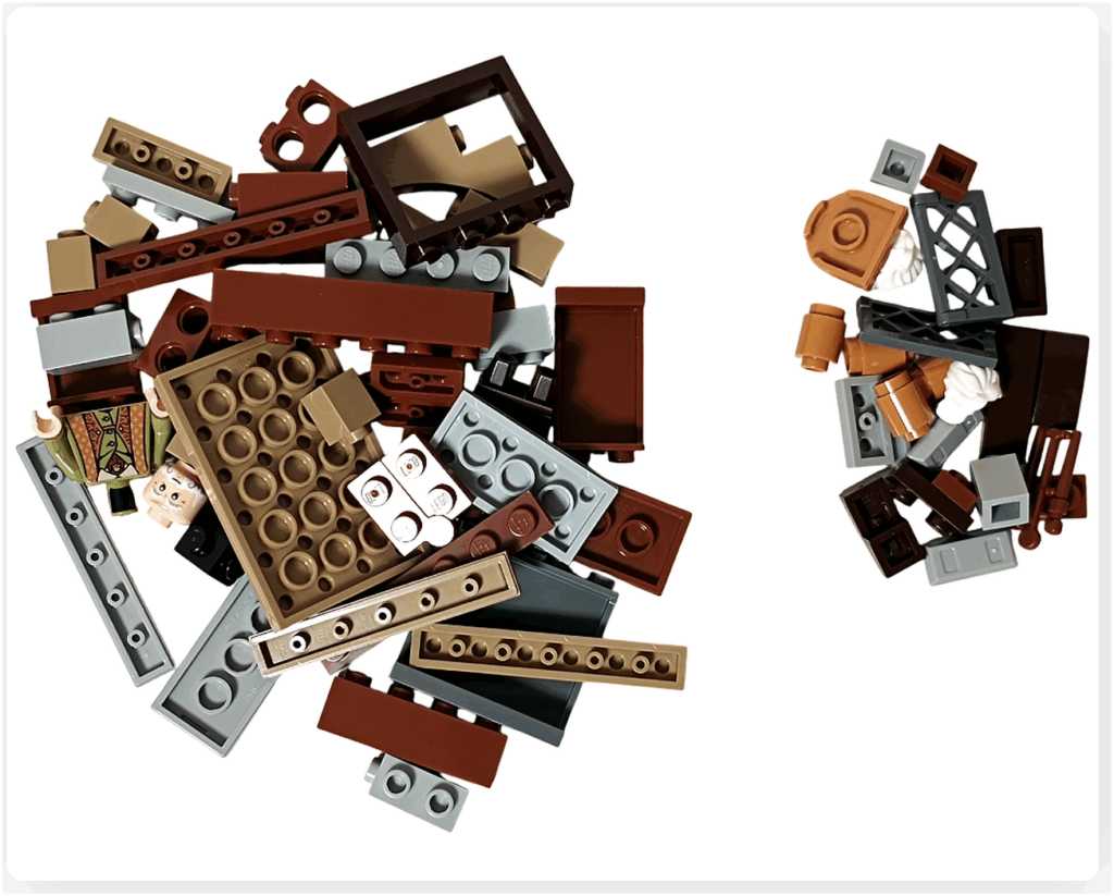 レゴ ハリー・ポッター 76442 ホグワーツ城 呪文学の教室 1袋目のパーツ内容。ブラウンとグレーの壁パーツ、机や本の小物、フリットウィック先生のミニフィギュア用パーツが並んだ様子