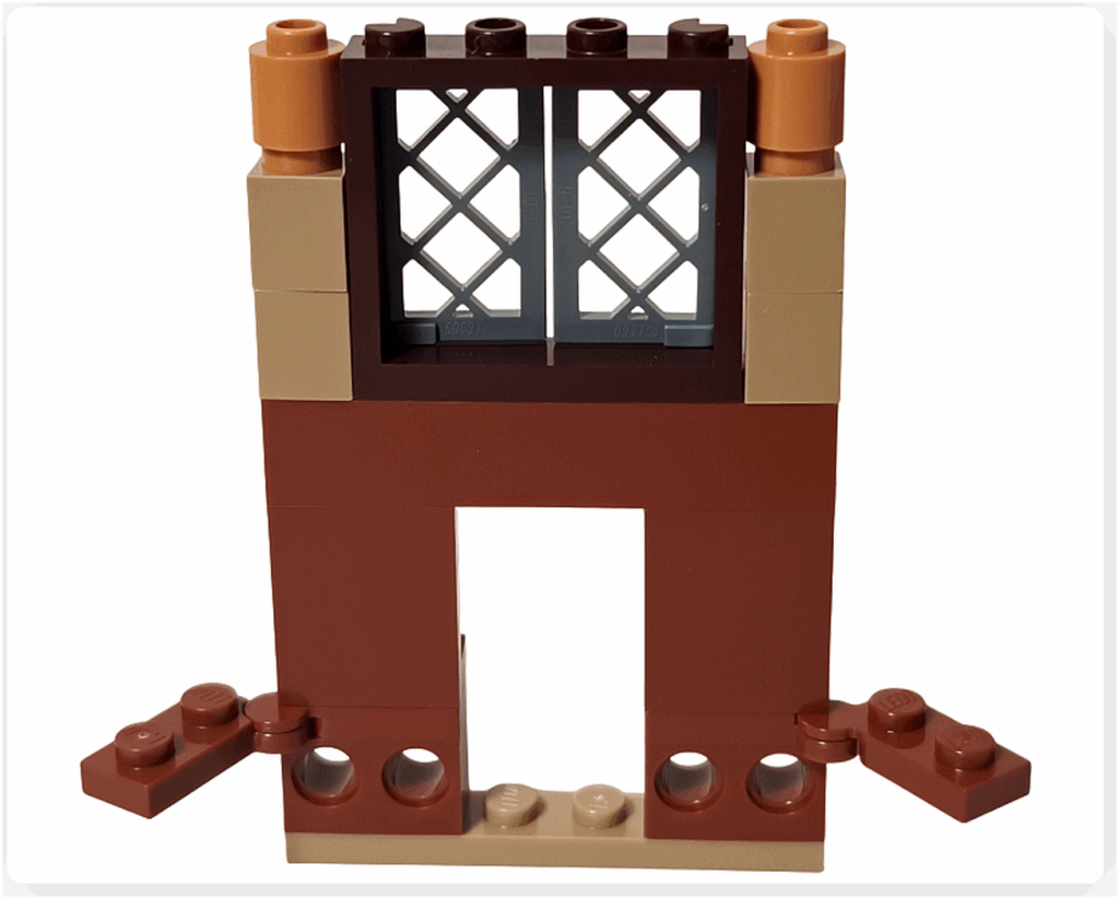 レゴ ハリー・ポッター 76442 呪文学の教室の奥の壁を組み立てている途中の工程。ブラウンのブロックが縦に積まれ、後に窓枠やアーチを取り付けるための基礎部分が作られている様子