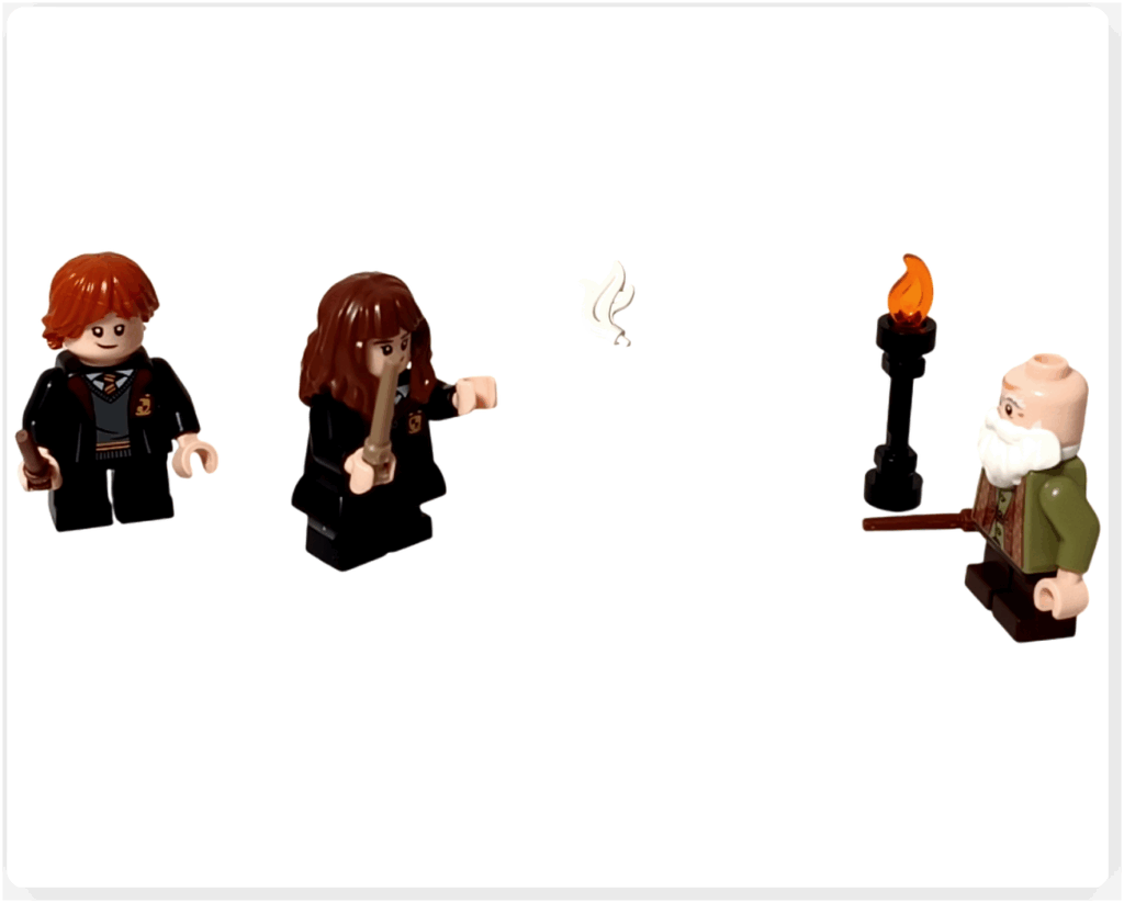 ハーマイオニーが呪文を唱えて羽根を浮かせる成功シーン。隣にはロンが見守り、フリットウィック先生が前方で指導している様子。