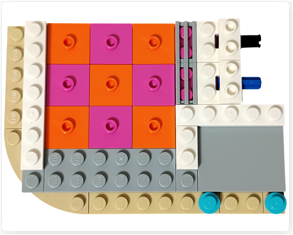 レゴ フレンズ 42674 組立レビュー第1部の床装飾工程。フローズンドリンクのお店の床にオレンジとピンクのパネルを配置し、店内の雰囲気が見え始めた状態。