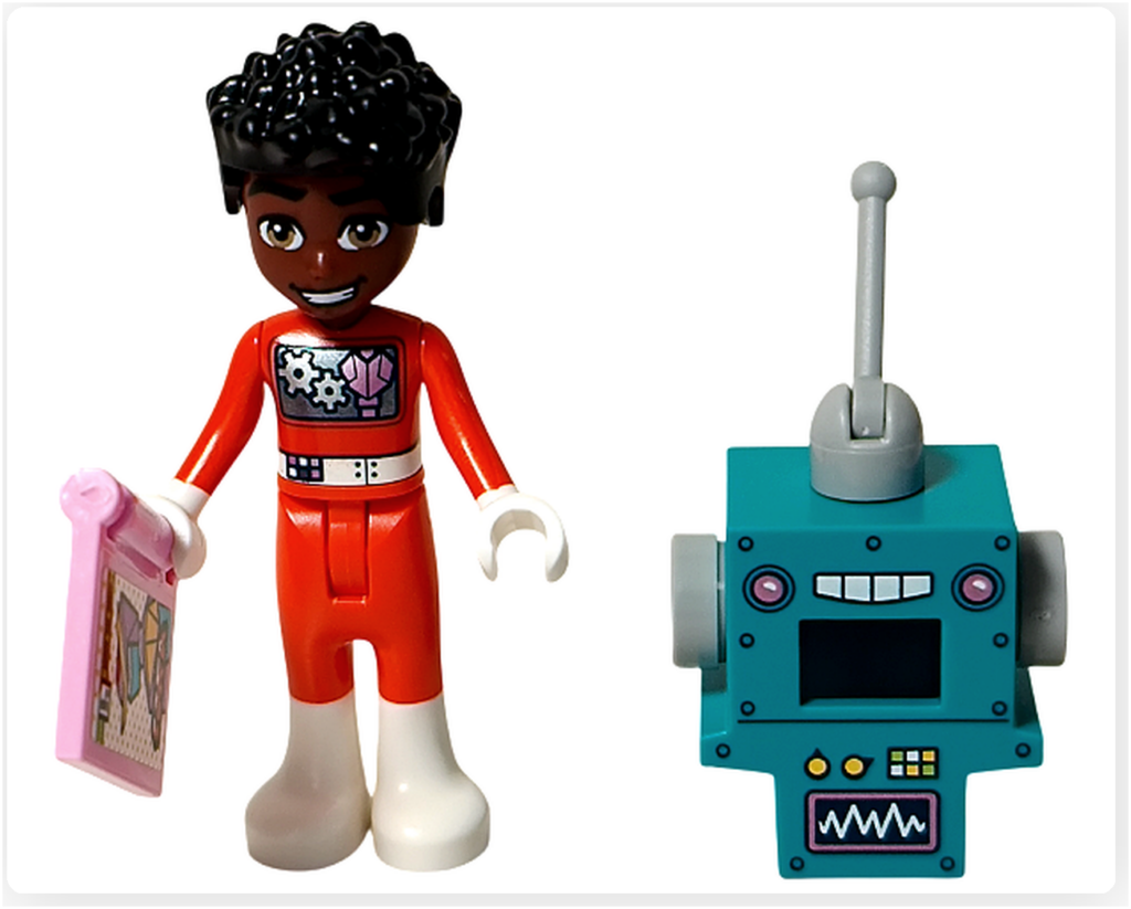 レゴ フレンズ 42674 組立レビュー第2部のザック写真。ロボットの被りものを外し、手にタイルパーツを持ったザックのミニドールとロボット被りものパーツを並べた状態。