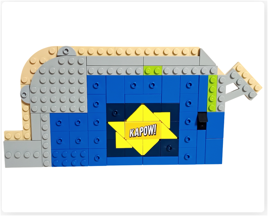 レゴ フレンズ 42674 組立レビュー第2部の1階コミックショップ床装飾写真。床中央に「KAPOW!」プリントタイルを配置したコミック風デザインの床を組み立てた状態。