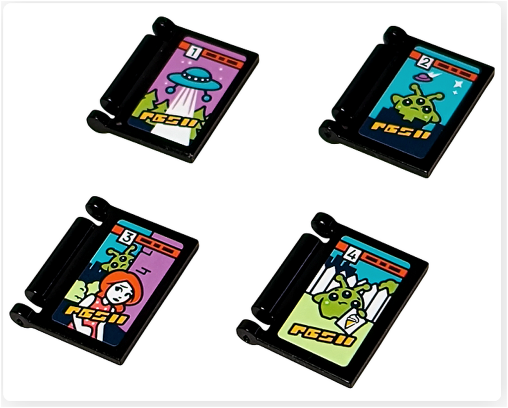 レゴ フレンズ 42674 組立レビューの写真。SFテーマのオリジナルコミック4冊。UFOやエイリアン、ヒーローが描かれた表紙デザインのミニコミックが並んでいる。