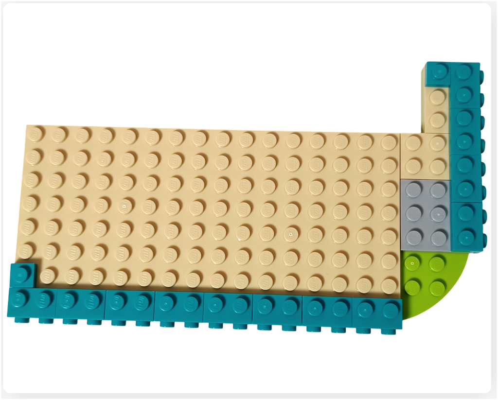 レゴ フレンズ 42674 コミックショップとゲームセンターの2階床を拡張している工程。ベージュの床プレートに周囲のパーツが追加され、上階スペースが広がっていく様子。