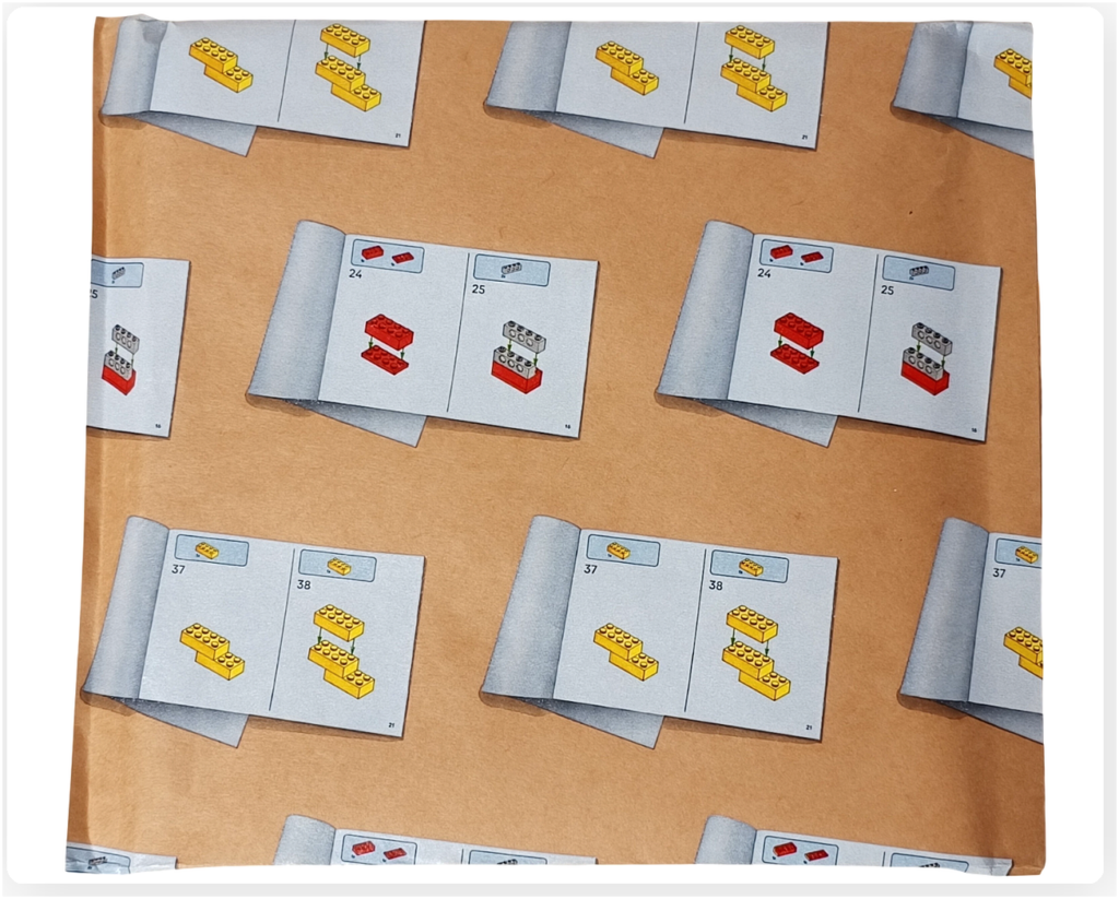 レゴ フレンズ 42674 コミックショップとゲームセンターの紙製パッケージ。組立説明書やステッカーが入っており、組立手順のイラストが印刷されている。