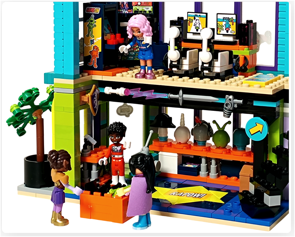 レゴ フレンズ 42674「コミックショップとゲームセンター」完成シーン コミックショップ前のザックとリアン、アリヤ、ノヴァ