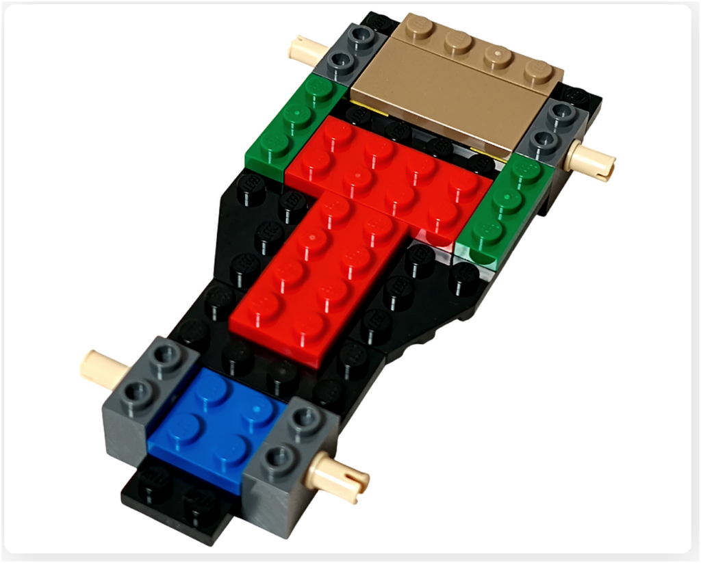 レゴ 40746 シーズナル クリスマスプレゼント配達トラックの組立途中。フロント側に軸パーツやブロックが追加され、車体前方の形が見えてくる工程です。