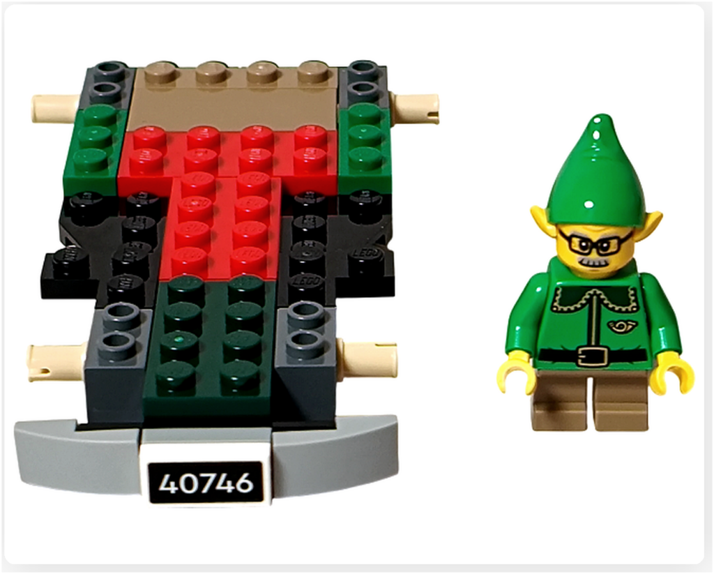 レゴ 40746 シーズナル クリスマスプレゼント配達トラックの袋1完成状態。車体の土台が組み上がり、エルフのミニフィグが隣に立つ構図の写真です。