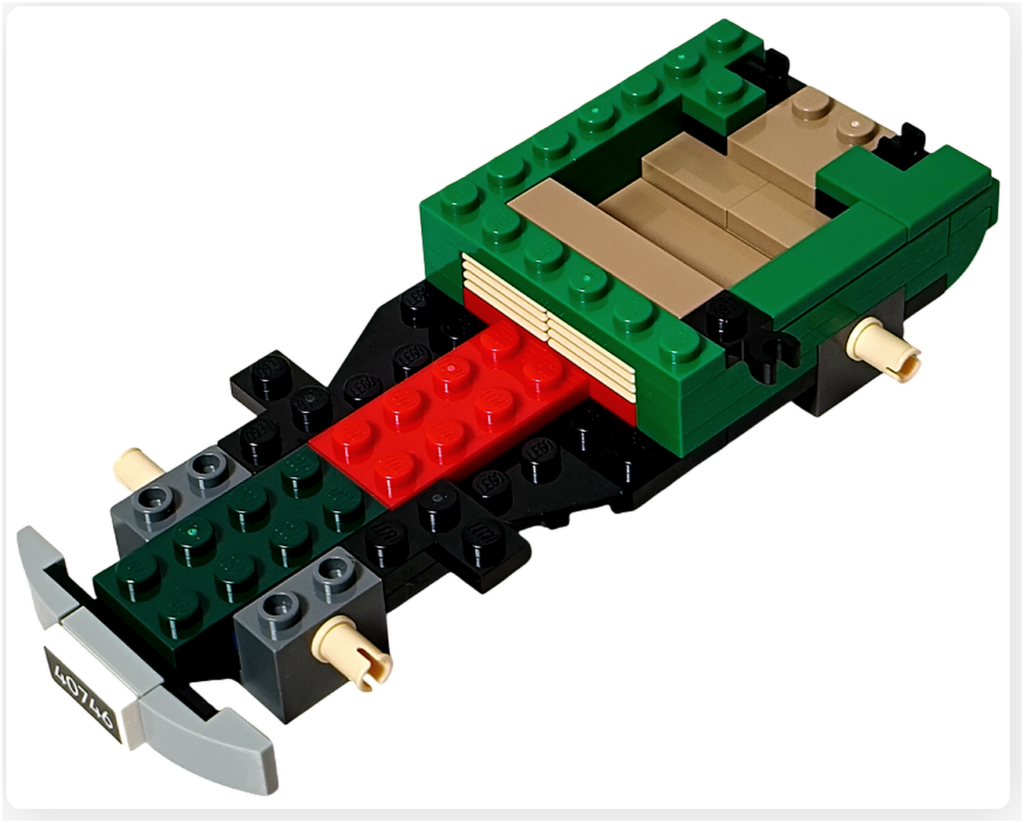 レゴ 40746 シーズナル クリスマスプレゼント配達トラックの組立途中。荷台の側面が緑のブロックで立ち上がり、小さな収納スペースが見えてきた工程の写真です。
