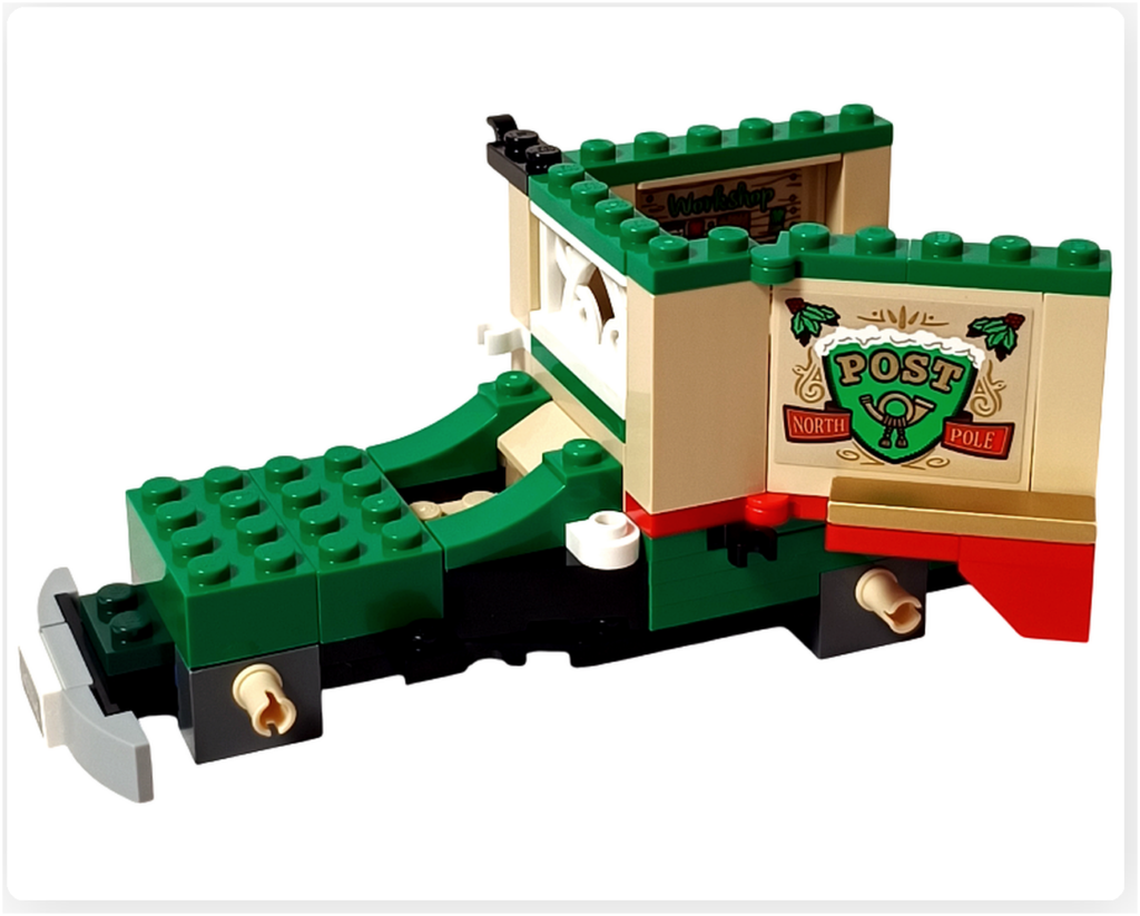 レゴ 40746 シーズナル クリスマスプレゼント配達トラックの左側面外側。パネルが半開きの状態で、POSTエンブレムのステッカーが見える工程写真です。