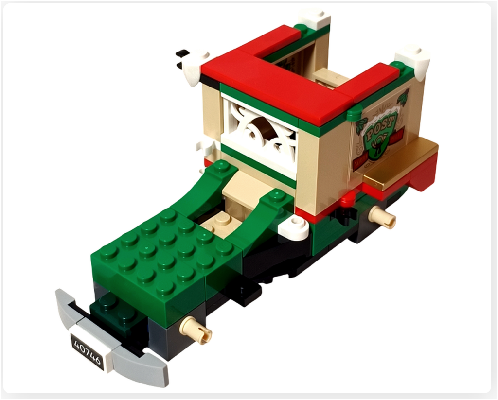 レゴ 40746 シーズナル クリスマスプレゼント配達トラックの屋根部分。荷台上部に赤いパネルを取り付け、緑とベージュの配色がまとまった工程写真です。