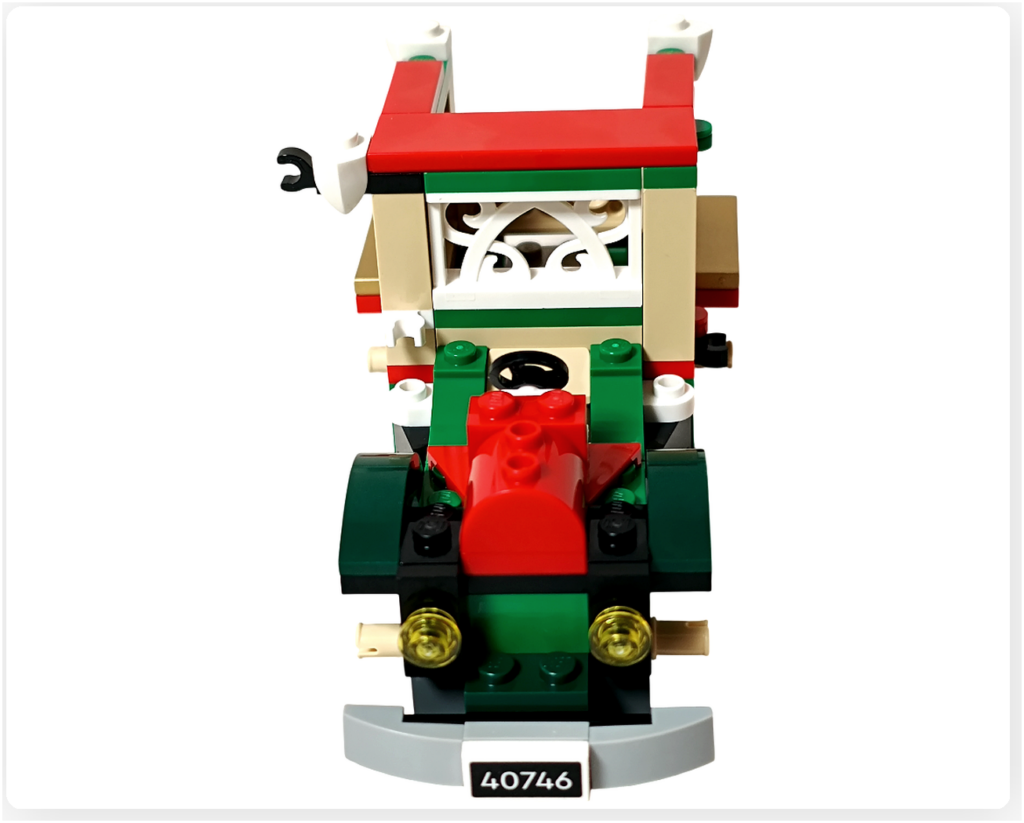 レゴ 40746 シーズナル クリスマスプレゼント配達トラックのフロント正面。赤いボンネットと丸いヘッドライト、バンパー部分の造形が確認できる組立途中の写真です。