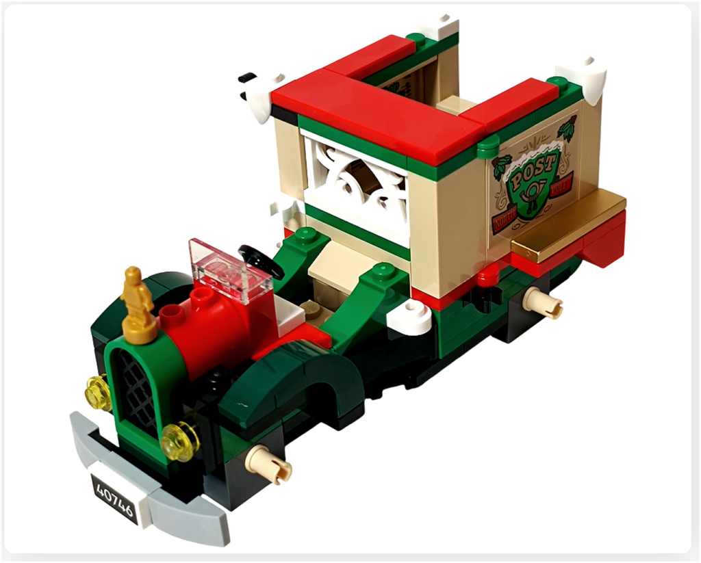 レゴ 40746 シーズナル クリスマスプレゼント配達トラックのフロント部分。金色のエンブレムと丸いライトが取り付けられ、クラシックデザインの特徴が分かる写真です。