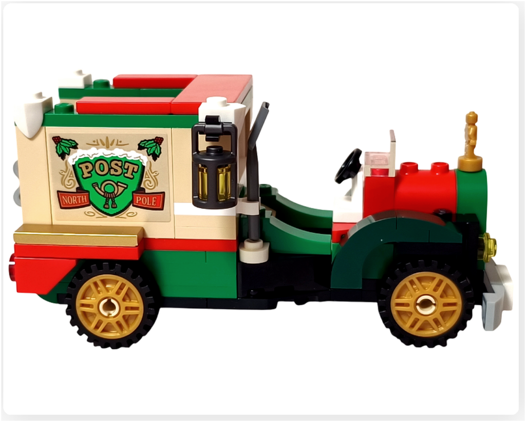 レゴ 40746 シーズナル クリスマスプレゼント配達トラックの右側面。金色ホイールのタイヤが取り付けられ、車体の外観や色構成が分かる状態を撮影した写真です。