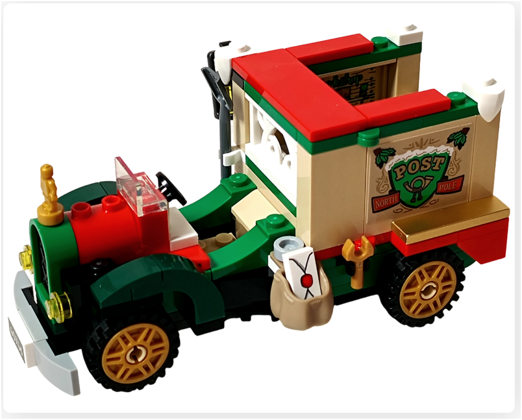 レゴ 40746 シーズナル クリスマスプレゼント配達トラックの側面に、郵便袋が取り付けられ、封筒のパーツが差し込まれた状態の写真です。金色のホイールや側面のPOSTロゴステッカーなど外観のディテールが分かります。